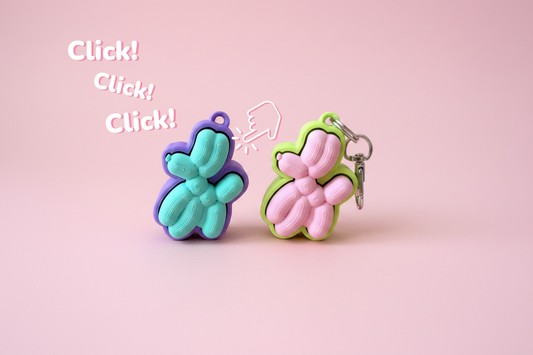 Llavero Clicker Perro Globo